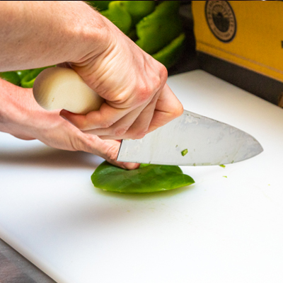 Chopping peppers - Nellie's Place